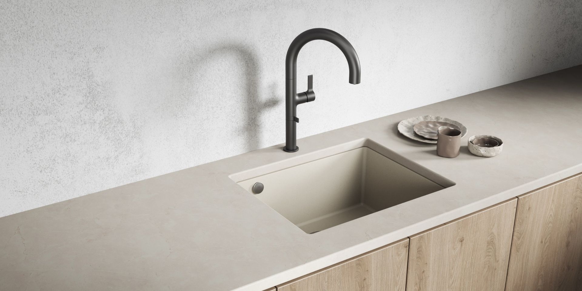 Light contemporary kitchen with a Laveo granite sink